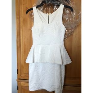 Elegant white peplum minidress